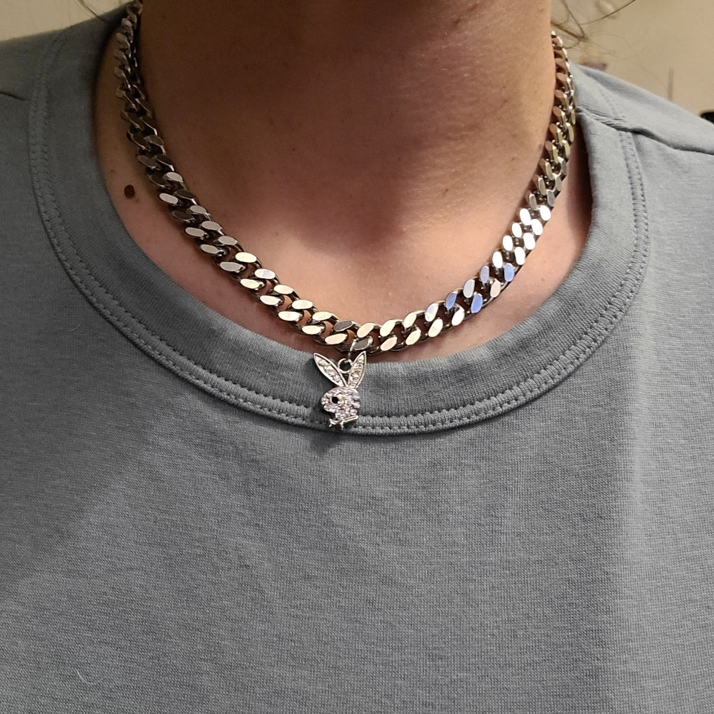 Rhodium plated necklace with playboy pendant